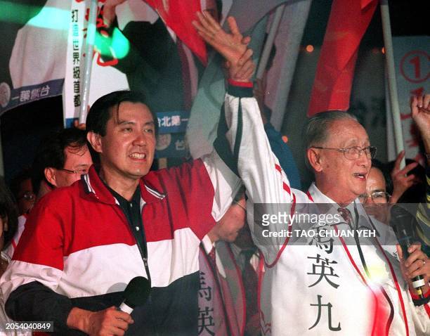 Koo Chen-fu , heavyweight member of the ruling Kuomintang recommends Ma Ying-jeou to supporters during a campaign rally in Taipei 02 December....