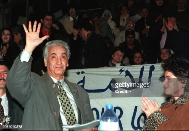 Hocine Ait Ahmed leader of the opposition Front of Socialist Forces waves to supporters 05 February in Algiers after being chosen as the FFS...