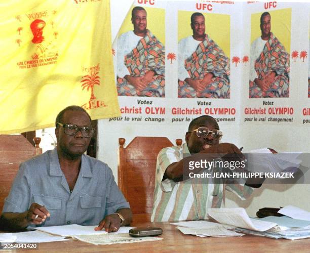 Members of the opposition party Union of Forces for Change announce to the press 22 June in Lome that their candidate, Gilchrist Olympio, now living...