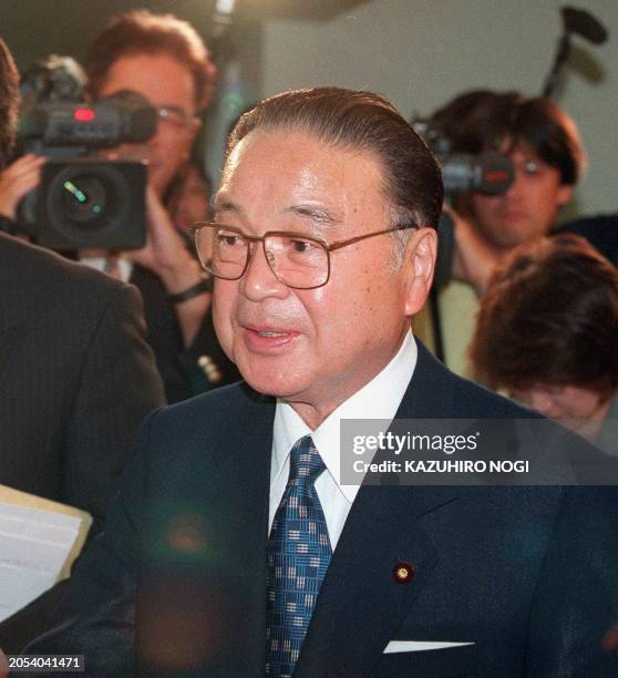 Former Chief Cabinet Secretary Seiroku Kajiyama, candidate for the Liberal Democratic Party's presidential election, arrives at a news conference for...