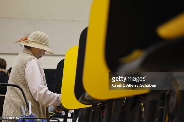 Boyle Heights, CA Almaluz Miranda, who has been voting since 1996 since she became a U.S. Citizen, of Boyle Heights, casts her ballot during Super...