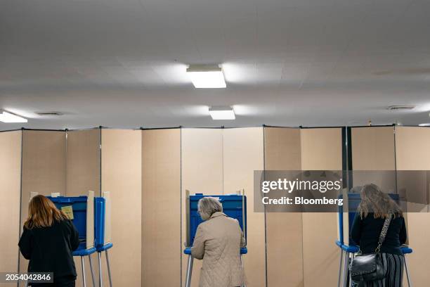 Voters cast their ballots at a polling station inside the Adamsville Baptist Church in Goldsboro, North Carolina, US, on Tuesday, March 5, 2024. This...