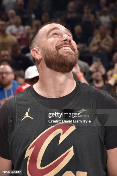 Travis Kelce smiles during the game between the Boston Celtics and the Cleveland Cavaliers on March 5, 2024 at Rocket Mortgage FieldHouse in...