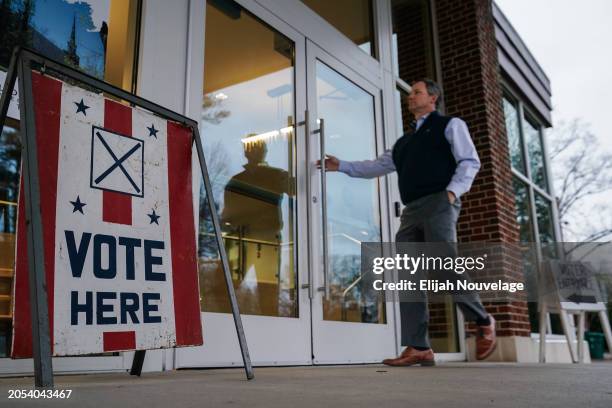 Voter enters a polling place to cast their ballots in the state's primary on March 5, 2024 in Mountain Brook, Alabama. 15 States and one U.S....