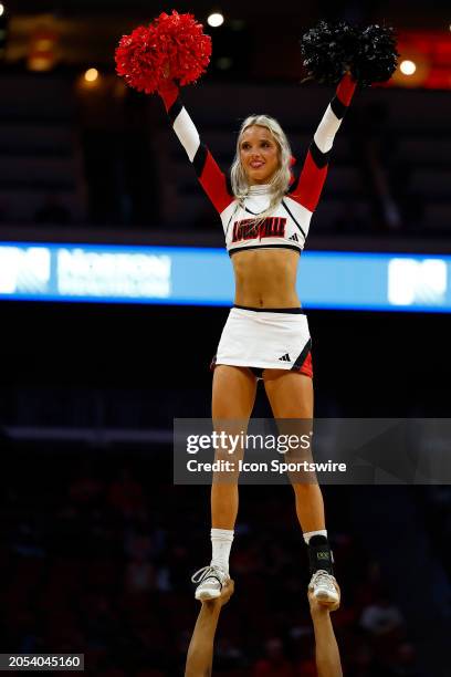 The Louisville Cardinals Cheerleaders preform during a mens college basketball game between the Virginia Tech Hokies and the Louisville Cardinals on...