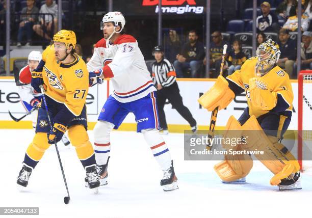 Nashville Predators defenseman Ryan McDonagh and goalie Juuse Saros defend against Montreal Canadiens right wing Josh Anderson during the NHL game...