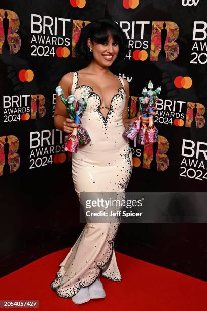 Raye poses with their Best New Artist, R&B Act, Song of the Year, Artist of the Year, Album of the Year and Songwriter of the Year Awards during the...