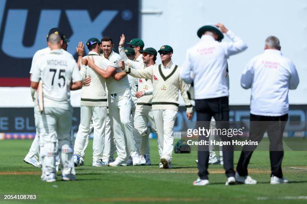 Australia celebrate the win during day four of the First Test in the series between New Zealand and Australia at Basin Reserve on March 03, 2024 in...