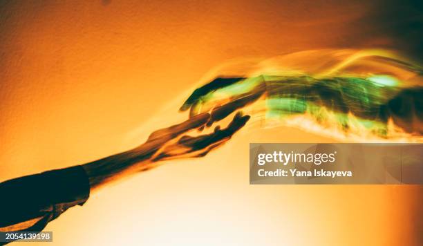 a holy touch. an image of an unknown yet bright future - inferno vida após a morte imagens e fotografias de stock