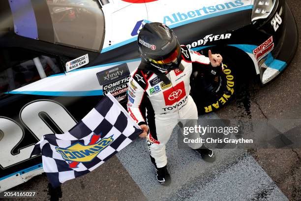 John Hunter Nemechek, driver of the Safeway/Albertsons Toyota, celebrates with the checkered flag after winning the NASCAR Xfinity Series The LiUNA!...