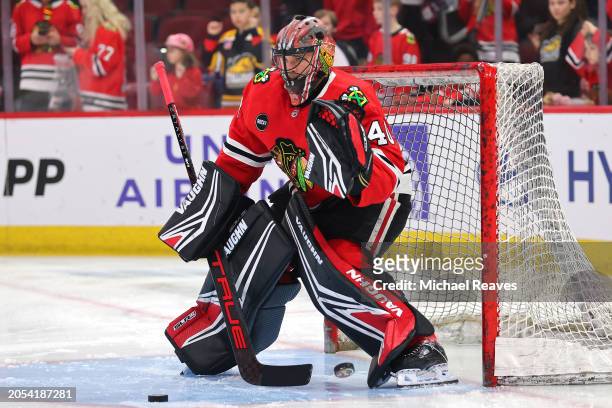 Arvid Soderblom of the Chicago Blackhawks warms up prior to the game against the Columbus Blue Jackets at the United Center on March 02, 2024 in...