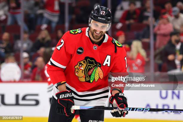 Nick Foligno of the Chicago Blackhawks laughs during warmups prior to the game against the Columbus Blue Jackets at the United Center on March 02,...