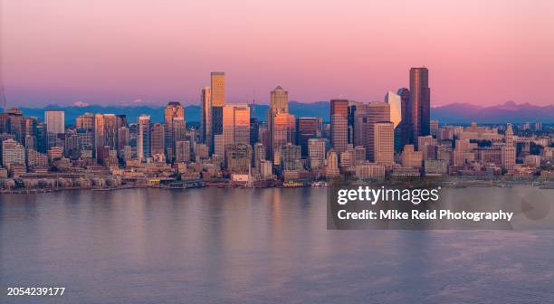 aerial sunset glow on downtown seattle skyline - lake washington stock pictures, royalty-free photos & images