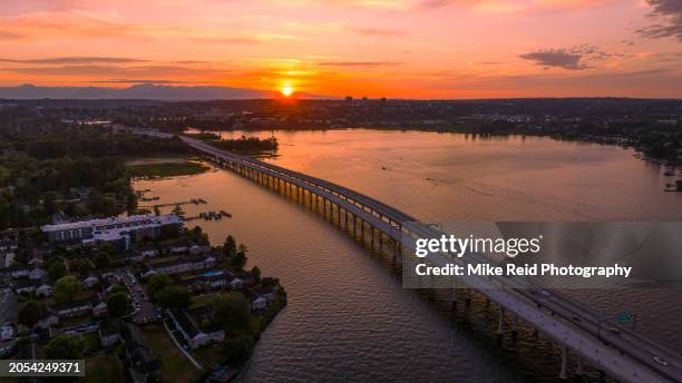 aerial seattle 520 floating bridge over lake washington sunset - lake washington stock pictures, royalty-free photos & images