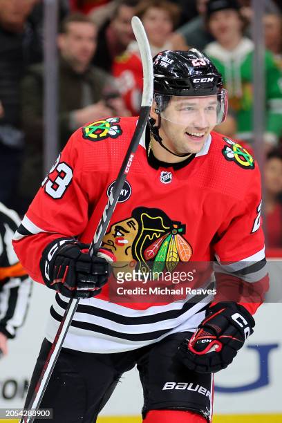 Philipp Kurashev of the Chicago Blackhawks celebrates after scoring a goal against the Columbus Blue Jackets during the first period at the United...