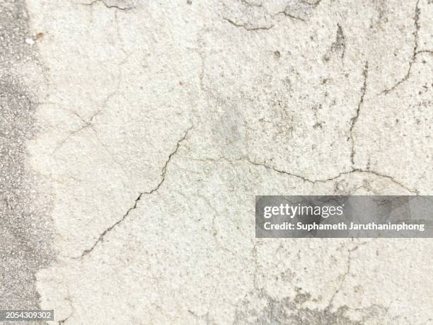 aged elegance: the art of cracked concrete. - surfacing stock pictures, royalty-free photos & images