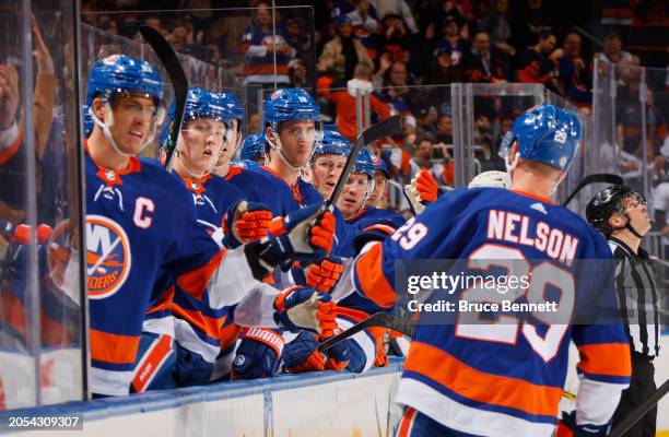 Brock Nelson of the New York Islanders celebrates his second period goal against Linus Ullmark of the Boston Bruins at UBS Arena on March 02, 2024 in...