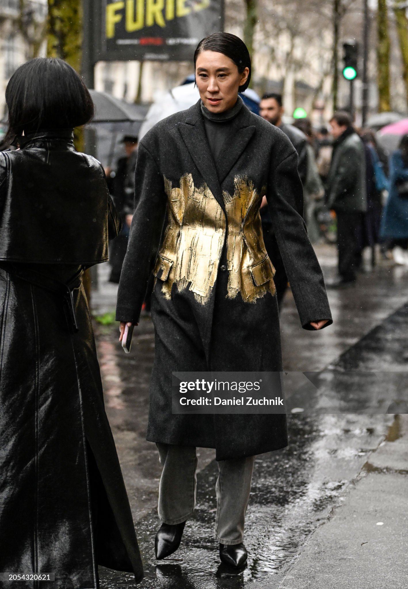 paris-france-eva-chen-is-seen-wearing-a-gray-and-gold-dries-van-noten-coat-gray-turtleneck-and.jpg