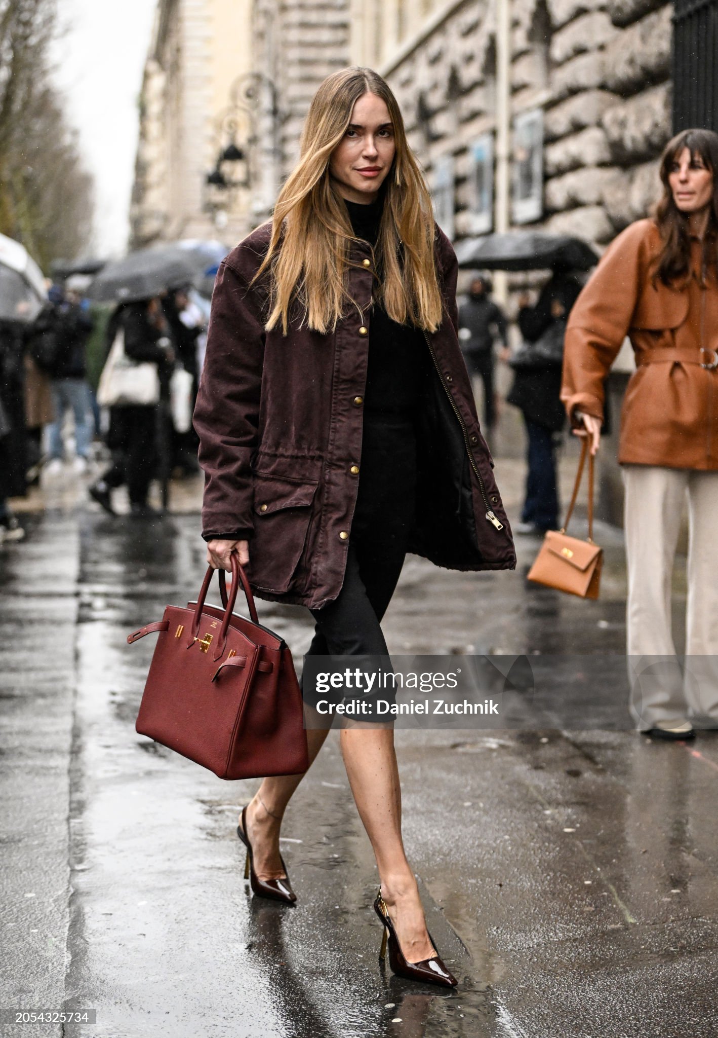 paris-france-pernille-teisbaek-is-seen-wearing-a-maroon-jacket-black-top-black-shorts-black.jpg