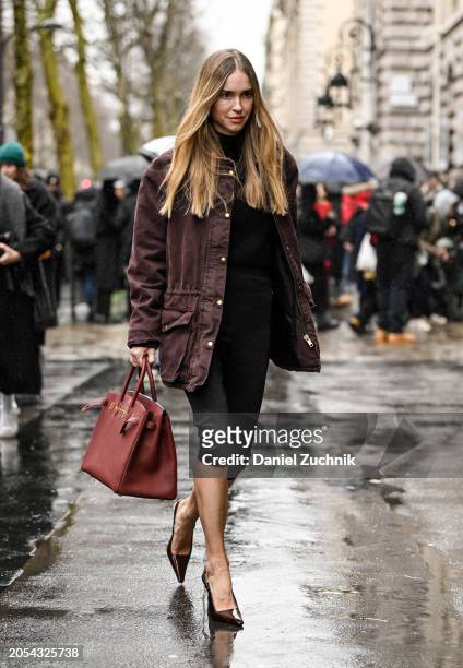 Pernille Teisbaek is seen wearing a maroon jacket, black top, black shorts, black heels and maroon Hermes bag outside the Hermes show during the...