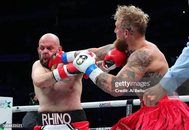 Jake Paul punches Ryan Bourland during their cruiserweight fight at Coliseo de Puerto Rico on March 02, 2024 in Hato Rey, Puerto Rico.