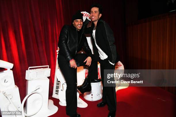 Meshach Henry and Nick Grimshaw attend RAYE's BRIT Awards after party at Decimo at The Standard, London on March 02, 2024 in London, England.