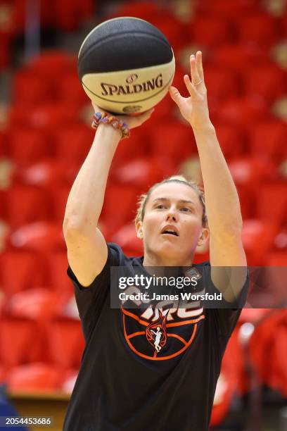 Sami Whitcomb of the Fire shoots as she warm's up before game two of the WNBL Semi Final series between Perth Lynx and Townsville Fire at Bendat...