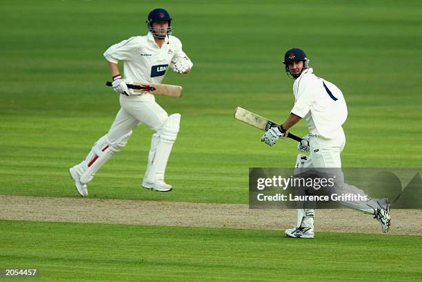 Mal Loye and Andrew Flintoff of Lancashire pile on the runs during the Frizzell County Championship match between Lancashire and Nottinghamshire held...