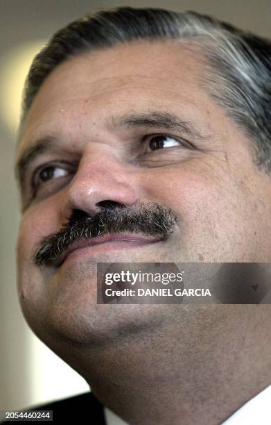 Argentine presidential candidate Ricardo López Murphy, of the Federal Movement of Recreation, speaks 16 April, 2003 to a group of businessmen from...