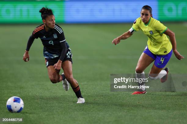 Julieta Cruz of Argentina controls the ball ahead of Rafaelle of Brazil during the first half at BMO Stadium on March 02, 2024 in Los Angeles,...