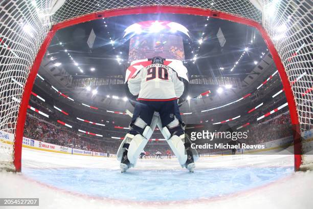Elvis Merzlikins of the Columbus Blue Jackets looks on prior to the game against the Chicago Blackhawks at the United Center on March 02, 2024 in...