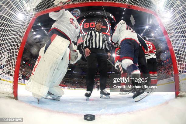 Elvis Merzlikins of the Columbus Blue Jackets reacts after a goal by Ryan Donato of the Chicago Blackhawks during the third period at the United...