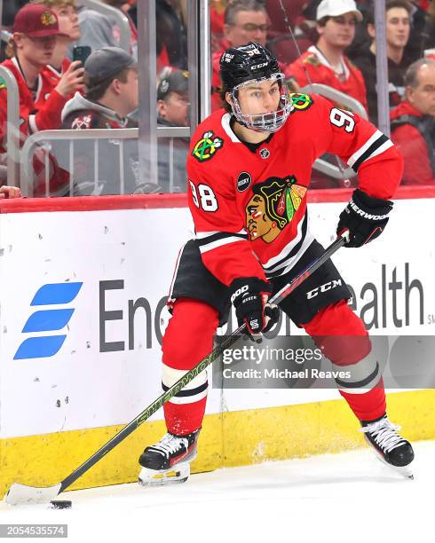 Connor Bedard of the Chicago Blackhawks controls the puck against the Columbus Blue Jackets during the first period at the United Center on March 02,...