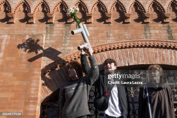 Students protest during a pro-Palestine demonstration in front of the prefecture with a fake weapon with flowers after a week before police beat...