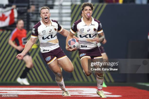 Billy Walters of the Broncos celebrates as Reece Walsh of the Broncos crosses to score a try during the round one NRL match between Sydney Roosters...