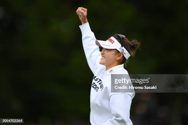 Chisato Iwai of Japan celebrates winning the tournament on the 18th green following the final round of Daikin Orchid Ladies Golf Tournament at Ryukyu...