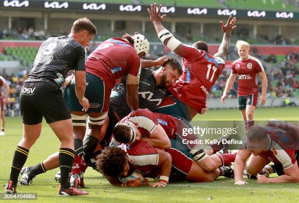 Zane Nonggorr of the Reds scores a try during the round two Super Rugby Pacific match between Hurricanes and Queensland Reds at AAMI Park, on March...