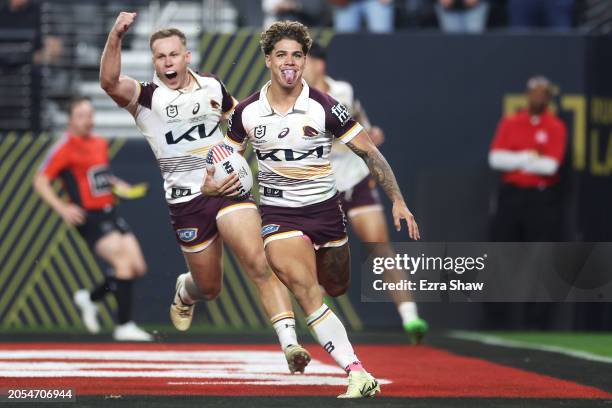 Billy Walters of the Broncos celebrates as Reece Walsh of the Broncos crosses to score a try during the round one NRL match between Sydney Roosters...