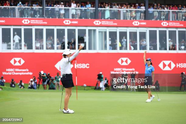 Hannah Green of Australia celebrates victory on the 18th green following a birdie putt during Day Four of the HSBC Women's World Championship at...