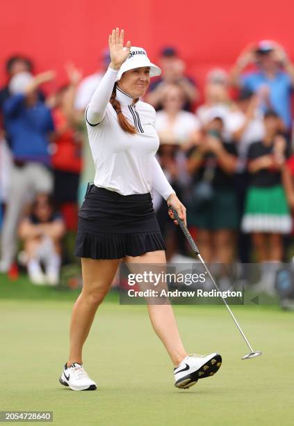 Hannah Green of Australia acknowledges the crowd following victory on Day Four of the HSBC Women's World Championship at Sentosa Golf Club on March...