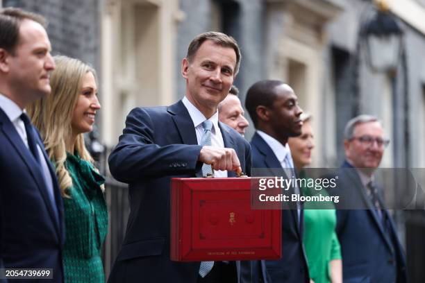 Jeremy Hunt, UK chancellor of the exchequer, departs 11 Downing Street to present his budget to parliament in London, UK, on Wednesday, March 6,...
