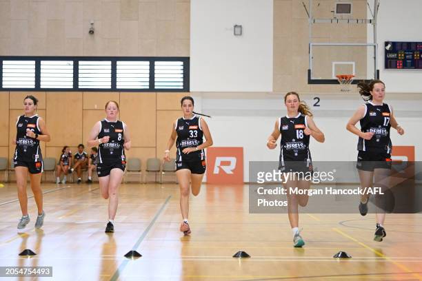 Olivia Wolter, Scarlett O'Donnell, Amelia Thomas, Grace Schrama and Claire Mahony of the Rebels completes a drill during Coates Talent League Girls...