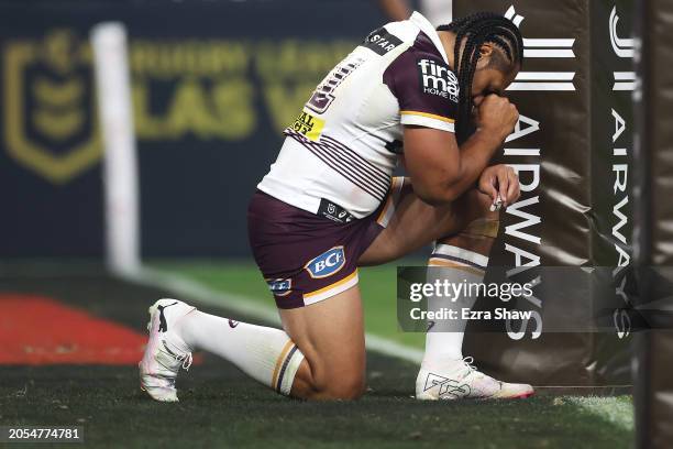 Martin Taupau of the Broncos takes a knee after the round one NRL match between Sydney Roosters and Brisbane Broncos at Allegiant Stadium, on March...