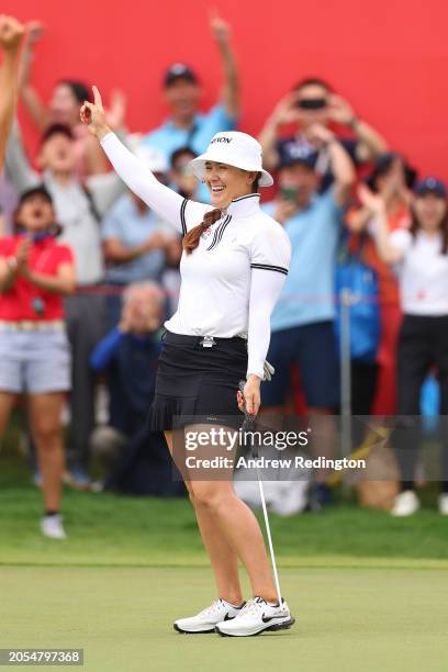 Hannah Green of Australia celebrates victory on the 18th green following a birdie putt during Day Four of the HSBC Women's World Championship at...