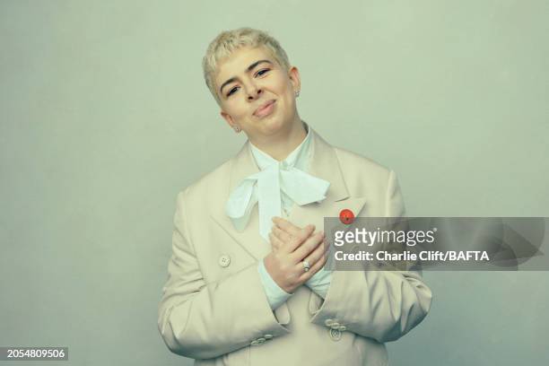 Film director and cinematographer Molly Manning Walker is photographed backstage at the 2024 EE BAFTA Film Awards, held at The Royal Festival Hall on...