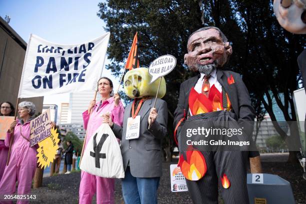 Members of the Extinction Rebellion protesting on the opening day of the Africa Energy Indaba outside Cape Town International Convention Centre on...
