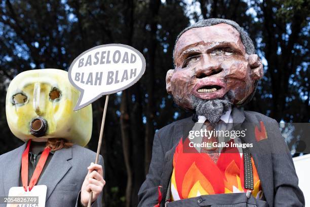 Members of the Extinction Rebellion protesting on the opening day of the Africa Energy Indaba outside Cape Town International Convention Centre on...