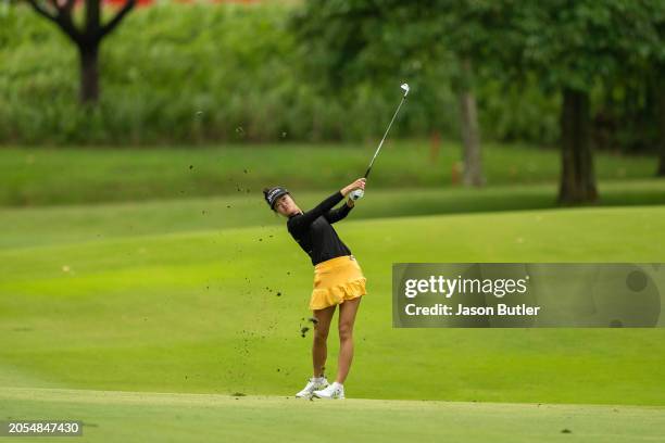 Grace Kim of Australia pitches onto the green on hole 1 during Day Four of the HSBC Women's World Championship at Sentosa Golf Club on March 03, 2024...