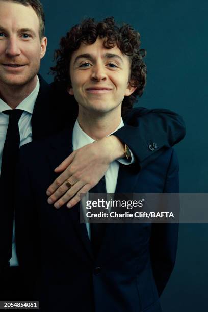 Director of photography Harry Wheeler and writer/director Joe Weiland are photographed backstage at the 2024 EE BAFTA Film Awards, held at The Royal...
