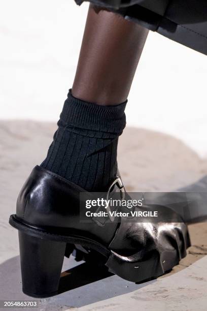 Model walks the runway during the Comme des Garçons Ready to Wear Fall/Winter 2024-2025 fashion show as part of the Paris Fashion Week on March 2,...